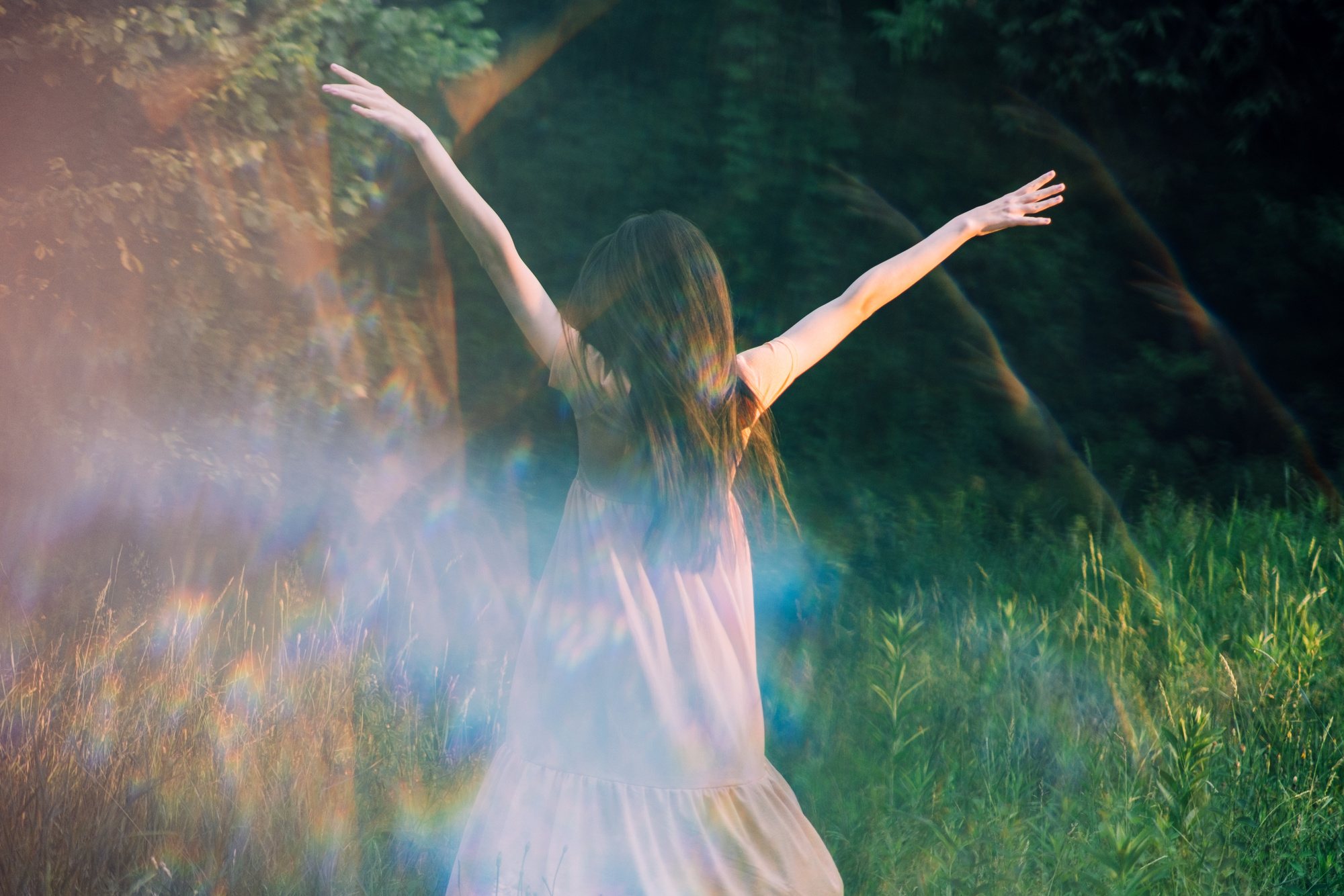 Moments of stillness. moments of self-care and self-soothing. Healing rituals and meditation. Dance Movement . Young woman dancing in nature background with reflection