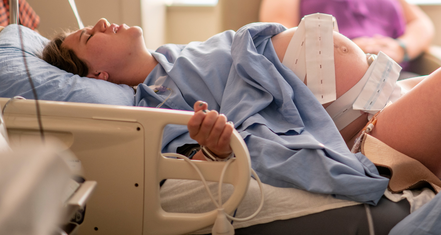 Pregnant Woman Giving Birth in a Hospital